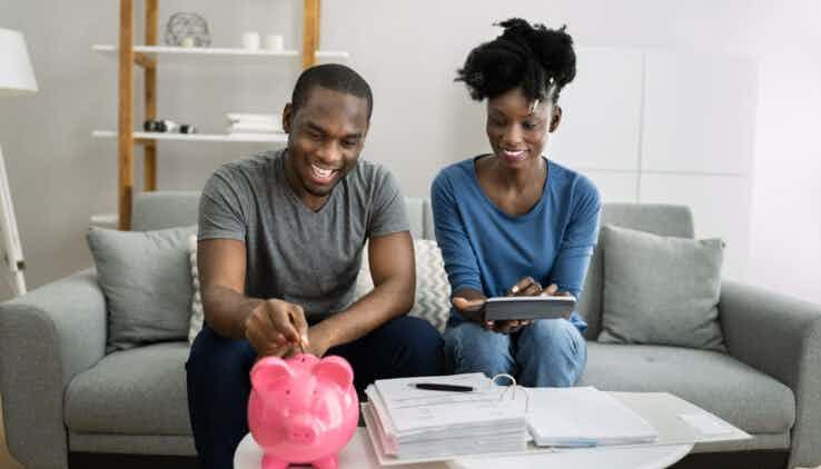 young couple making financial goals