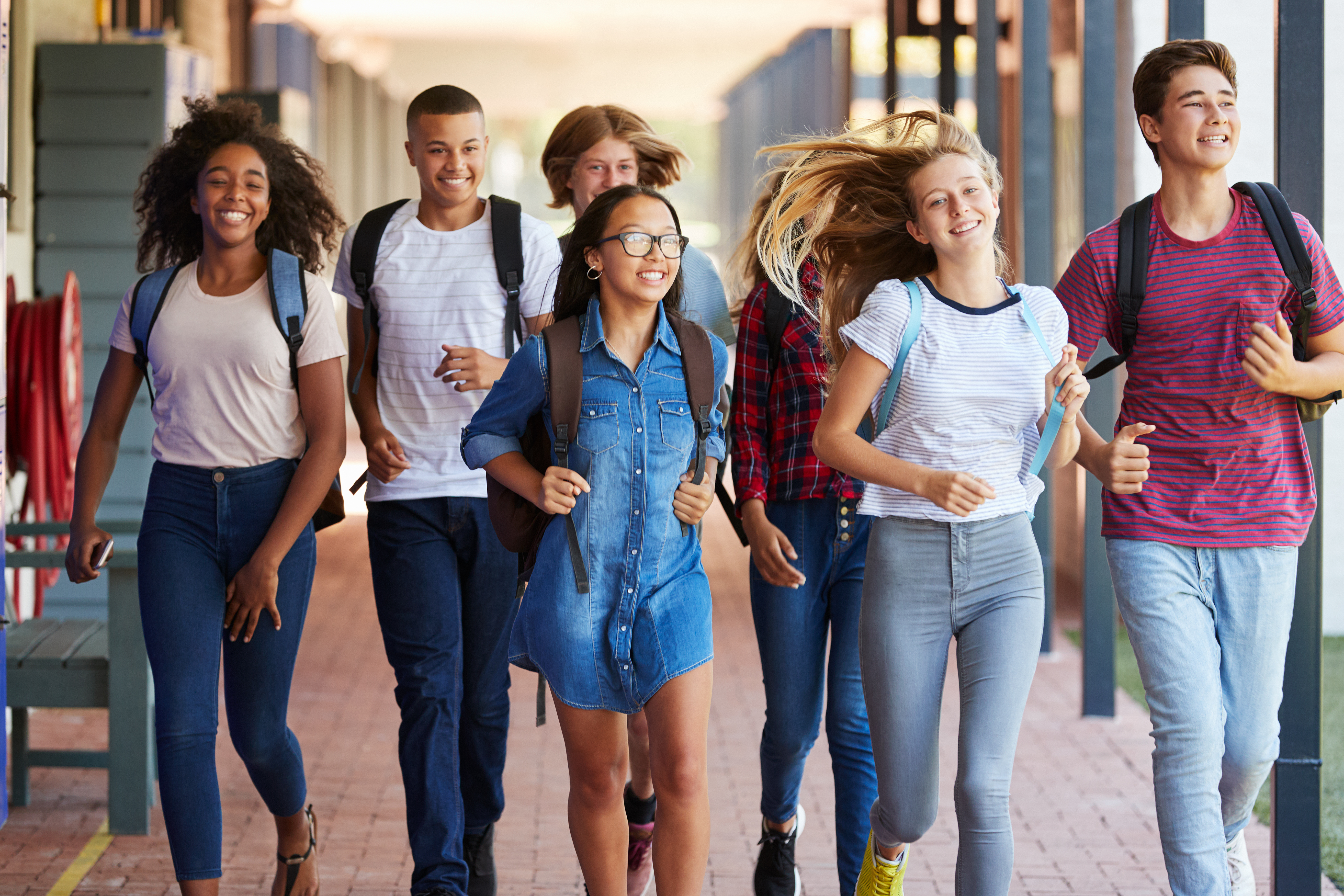 Kids Walking Down School Hall